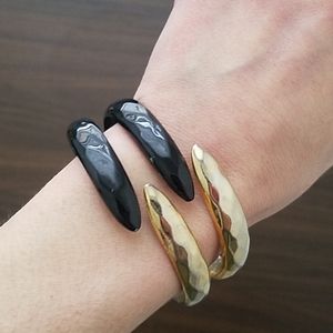 Vintage gold and black hinged metal bracelet